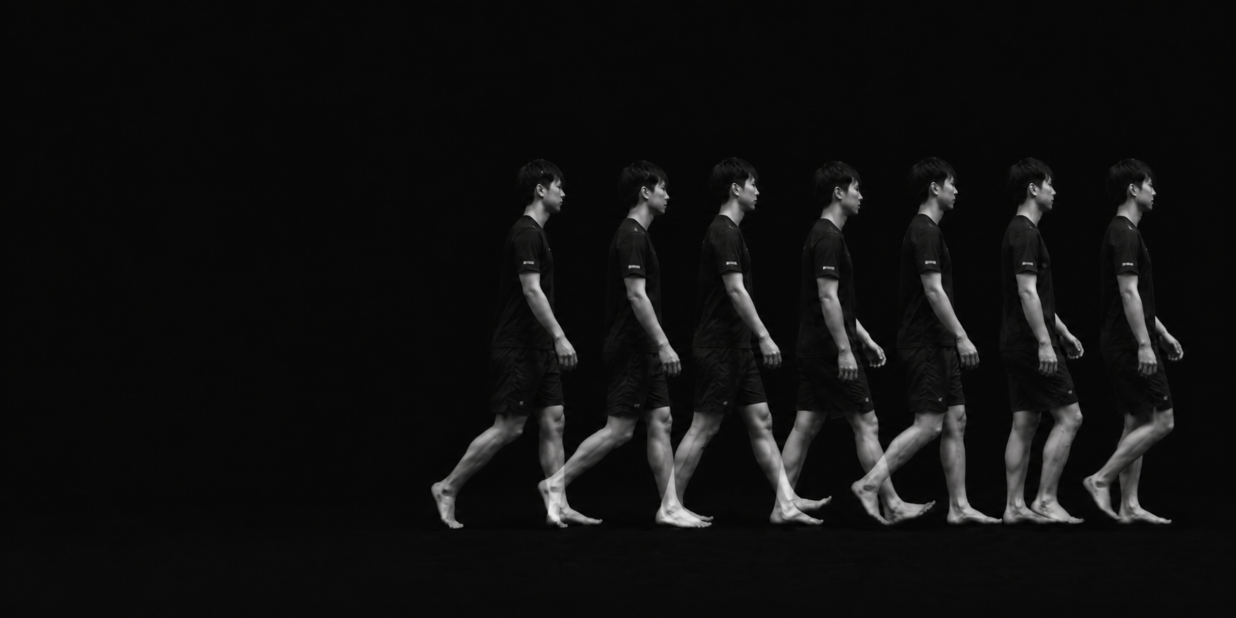 Monochrome motion study showing sequential phases of a person walking
